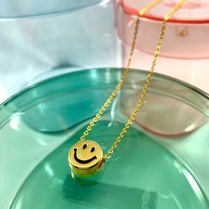 3/$15 gold smiley face necklace